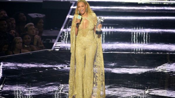 Beyonce accepted the Best Female Video award from Team USA's gold medallist gymnasts. (AFP/Jason Kempin)