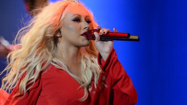 The Voice coach treated the audience to her catalog of hits including Beautiful, Cnadyman and Dirrty. (AFP/Fadel Senna)