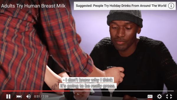 An adult a little grossed out by breast milk. (YouTube screenshot)