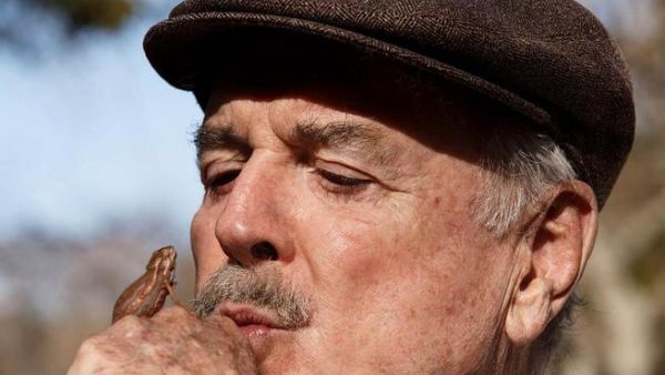 John Cleese the comic with a "stand-up chameleon" in South Africa (Image: Twitter)