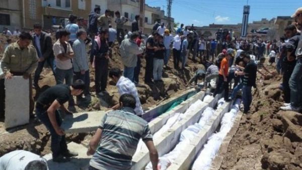 Mass burial at Houla, Syria