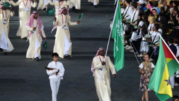 Team Saudi enters the Olympic Opening Flag Ceremony: Behind every man...a woman!