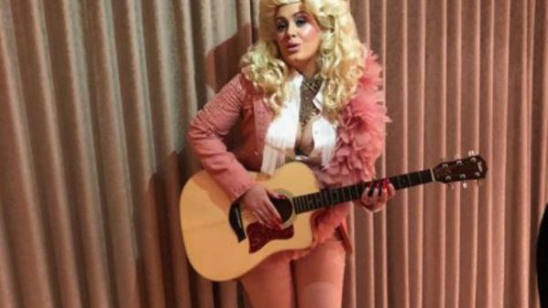 The 29-year-old British singer caught Parton's eye Tuesday on Instagram after posting a photo of herself in a blonde wig and pink suit. (Source: @adele - Instagram)
