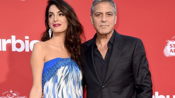 Amal and George Clooney. (KEVIN WINTER / GETTY IMAGES NORTH AMERICA / AFP)