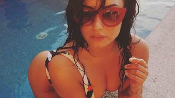 Demi posted a bevy of sultry poolside pics on Friday. (Source: ddlovato - Instagram)