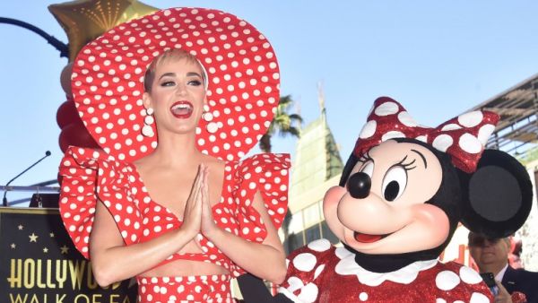 Walt Disney Company CEO Bob Iger and recording artist Katy Perry delivered brief remarks about Minnie as her star was unveiled (Source: Frederic J. Brown - AFP)