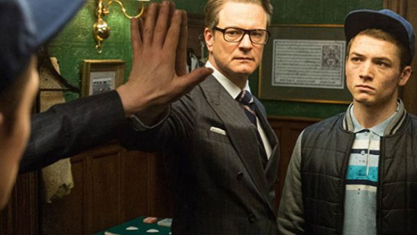 Harry Hart contemplates life as Eggsy wonders what the hell is going on. (20th Century Fox)