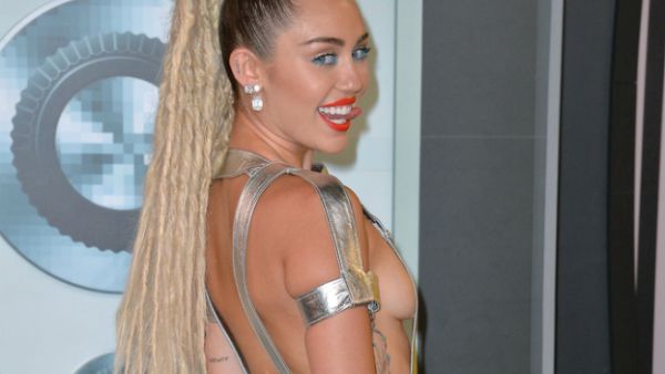 Miley Cyrus desperately tries to be edgy. (Featureflash Photo Agency / Shutterstock.com)