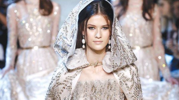 A model presents a creation by Elie Saab as part of the collection. (AFP)