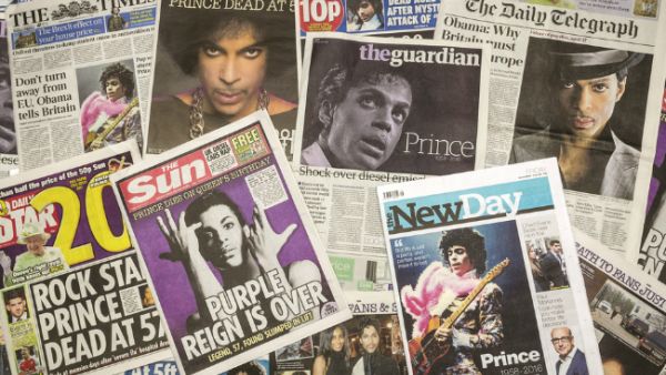Newspapers announcing Prince's death. (Lenscap Photography / Shutterstock.com)