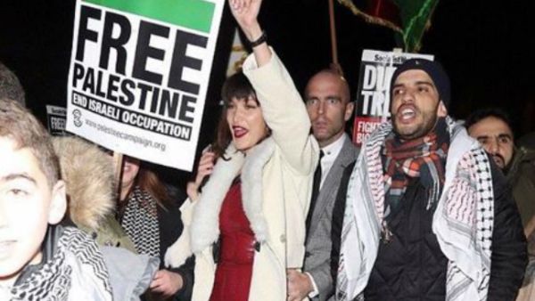 Palestinian/American model Bella Hadid didn’t just protest on her Instagram account, as she was spotted yesterday in a protest outside the US embassy in London.(Source: Instagram @le.firdaws)