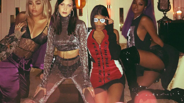 Bella Hadid posted on Instagram, showing herself wearing a pointed party hat as she posed with friends on New Years Eve. (Instagram) 