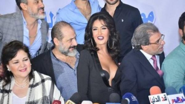 They're not angry because she's looking away from everyone.