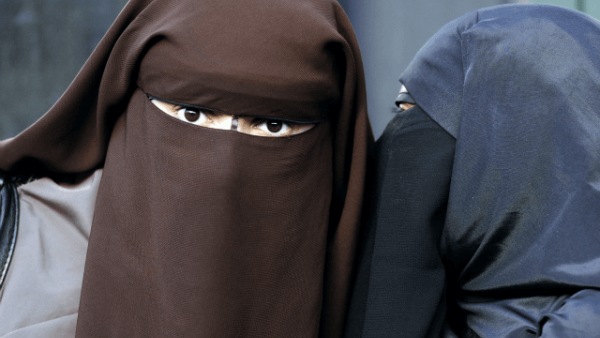 The statements come after Muslim wife of a convicted terrorist, Moutia Elzahed, was charged for refusing to stand before a court (AFP/File)