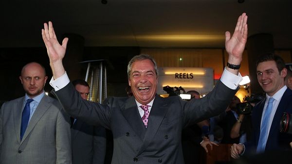 UK Independence Party leader Nigel Farage celebrates Brexit's success this morning (AFP)