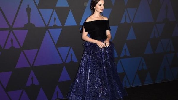 Lily Collins wore a gown by Georges Chakra. (AFP)