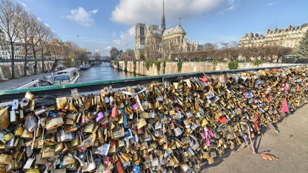 French authorities began removing the 'love locks' after a section of the bridge partially collapsed under the weight. (Shutterstock)
