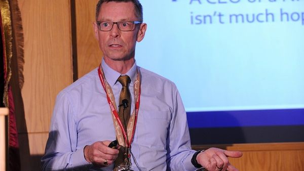 Peter Bohan, Director of Occupational Health and Wellbeing at Sidra Medicine, speaking at Weill Cornell Medicine-Qatar’s (WCM-Q) Grand Rounds.