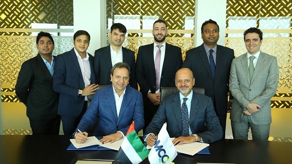 Gautam Sashittal, DMCC CEO, and Shailesh Javeri Stargems, Group Chairman, with officials during the signing ceremony. 