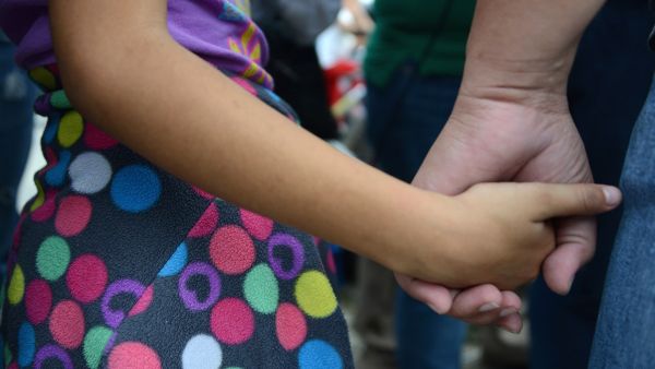 Holding hands: Mohamed Bzeek seeks to help terminally-sick children in the U.S. (AFP / File Photo)