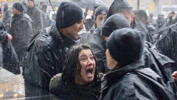 A woman shouts at Turkish riot police as they detain her during a rally  in Ankara (AFP/File Photo)