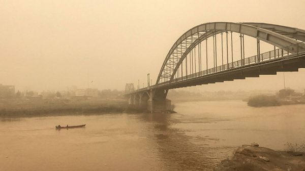 A picture taken on Feb. 18, 2017 shows a general view of a bridge in the Iranian city of Ahvaz during a sandstorm. (AFP)
