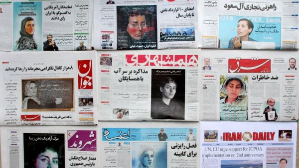 A picture taken in the capital Tehran on July 16, 2017 shows the front pages of Iranian newspapers bearing portraits of the top female scientist Maryam Mirzakhani (AFP)