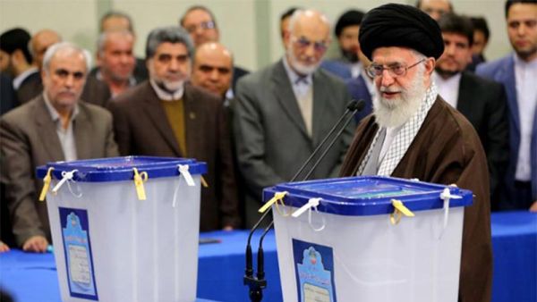 Ayatollah Ali Khamenei (R) casting his vote in Tehran. (AFP)