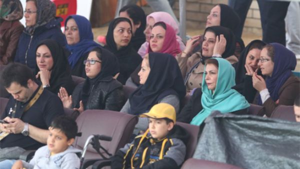 Iranian women attend a volleyball tournament on the resort Kish Island. (Twitter)