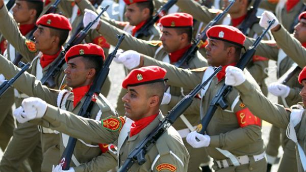 Members of the Iraqi armed forces march during a military parade at Tahrir Square in central Baghdad to celebrate the recapture of Fallujah from the Islamic State (IS) group jihadists.(AFP/File)
