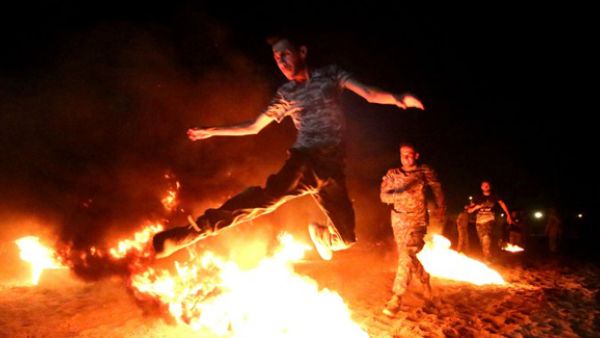New recruits attend a training given by the Furqat al-Abbas brigades at the brigade's headquarters east of the southeastern Iraqi city of Basra. (AFP/File)