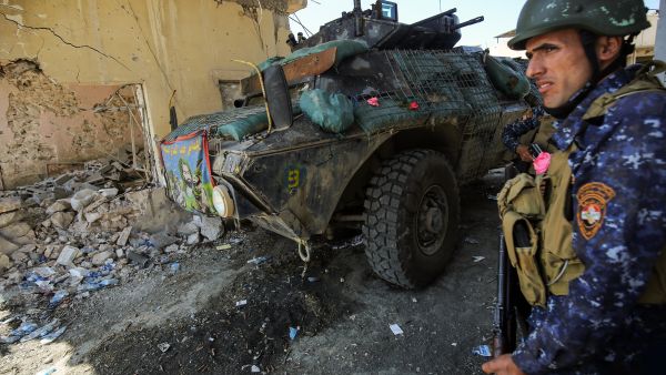 A member of the Iraqi forces stands next to an armored vehicle in Mosul, April 16 2017. (AFP/Ahmad al-Rubaye) A member of the Iraqi forces stands next to an armored vehicle in Mosul, April 16 2017. (AFP/Ahmad al-Rubaye)