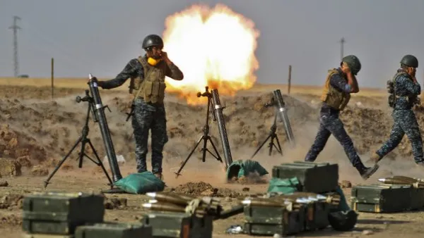 Iraqi soldiers firing mortars. (AFP/File)