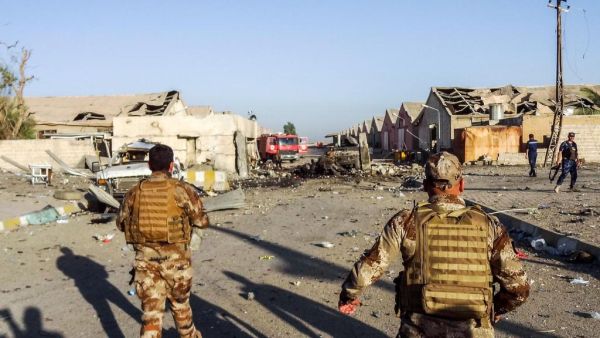 Iraqi Counter-Terrorism Service (CTS) members arrive at scene of an attack outside warehouses where ballots from May 12 parliamentary vote are stored in the northern multi-ethnic city of Kirkuk July 1, 2018. (Marwan Ibrahim / AFP)