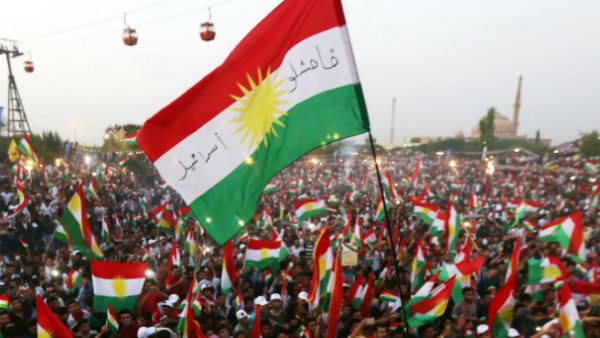 Iraqi Kurds fly Kurdish flags during an event to urge people to vote in the upcoming independence referendum. (AFP/ File)