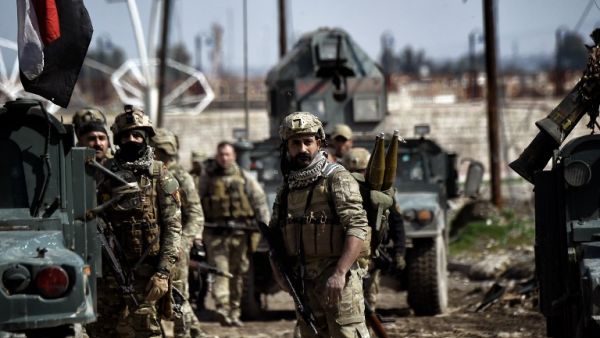 Iraqi forces gather in position as they prepare for clashes with Daesh fighters in Mosul on March 5, 2017. (AFP/Aris Messinis) Iraqi forces gather in position as they prepare for clashes with Daesh fighters in Mosul on March 5, 2017. (AFP/Aris Messinis)