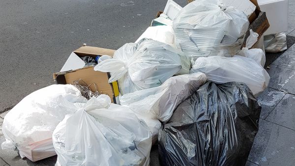 A number of street cleaners told Arab News they are given SR700-SR2,500 each month in cash handouts from passing motorists. (shutterstock)