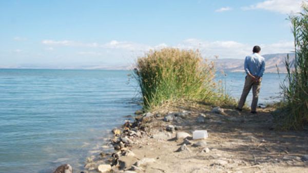 Friends of the Earth Middle East Director Gidon Bromberg stands at the shore of the Dead Sea. (Waterworld)