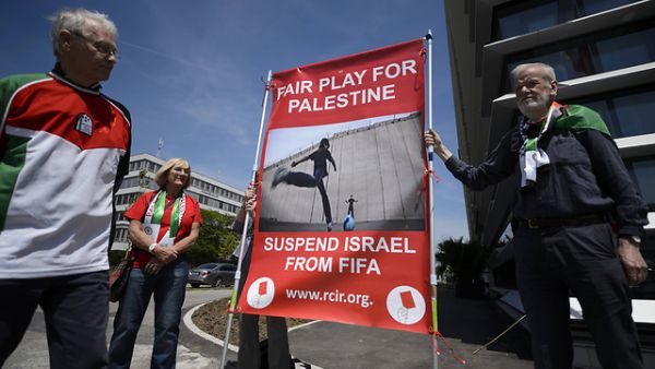 Protesters in Zurich call for Israel's suspension from FIFA. (AFP/File)