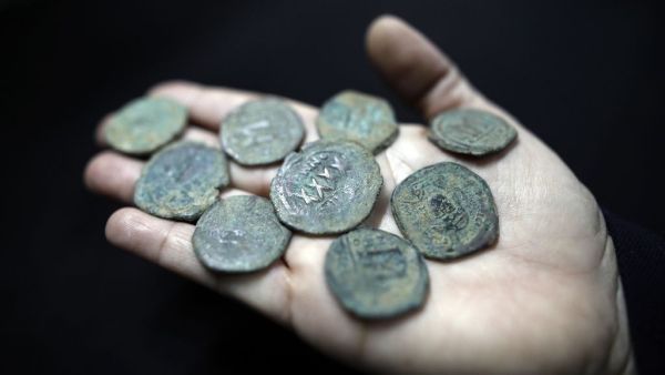 Ancient coins from the Byzantine Empire era (Seventh century) displayed during a press tour of the authority's storerooms on March 19, 2017. (AFP/Menahem Kahana)