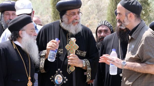 Jordanian Prince Ghazi Bin Mohamed and Pope Tawadros II, the head of Egypt's Coptic Orthodox Church, visit Bethany beyond the Jordan river. (AFP/Khalil Mazraawi)
