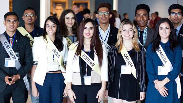 Ayat Amer, a NASA internship winner, poses for a group photo at the UN headquarters in September. (Courtesy of Ayat Amer)