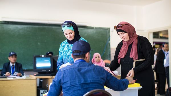 Two women cast their ballots in parliamentary elections in Amman, Jordan, on Sept. 20, 2016. (Lindsey Leger)