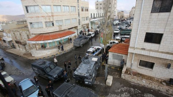 Jordanian security forces are seen patrolling on December 19, 2016 in Karak, a tourist destination, around 70 miles south of the capital Amman, following an attack a day earlier. (AFP/Khalil Mazraawi)
