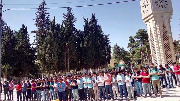 University of Jordan students perform communal funeral prayers for civilians killed in Aleppo this week. (Twitter/Rami Safadi)