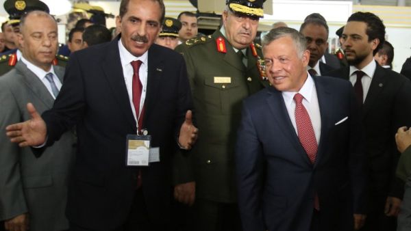Jordan's King Abdullah II greets the public as he arrives at the opening of the Special Operations Forces Exhibition and Conference (SOFEX) in Amman on May 8, 2018 (KHALIL MAZRAAWI /AFP)