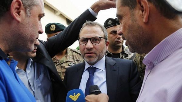 Lebanon's Foreign Minister Gibran Bassil talks to the media as he gathered ambassadors near Beirut international airport on October 1, 2018 during a tour of alleged missile sites around the Lebanese capital
