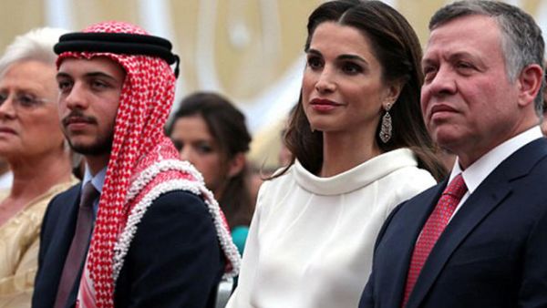 King Abdullah II (R) and Queen Rania of Jordan. (AFP/ File)