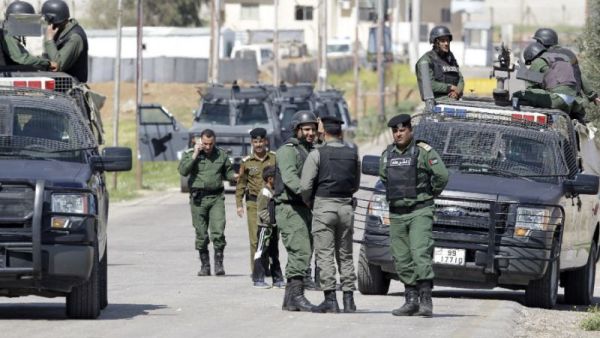 Members of the Jordanian security forces stand guard at a border crossing. (AFP/ File Photo)