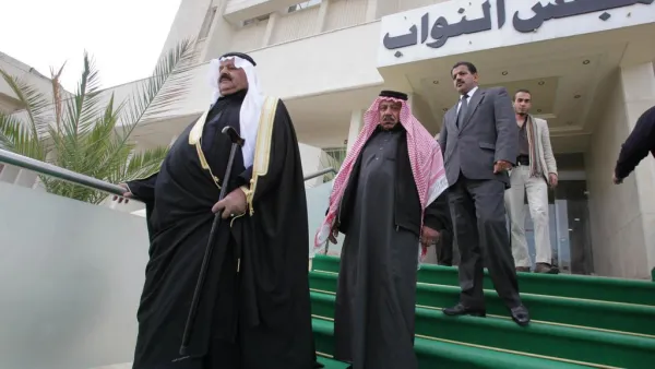 Jordanian MPs leave the parliament building in Amman. (Khalil Mazraawi / AFP Photo)